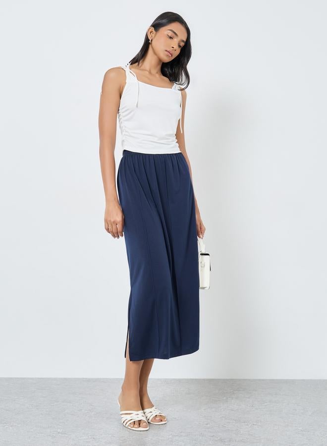 تايك تو تنورة ميدي سادة بشق جانبي - Image 1