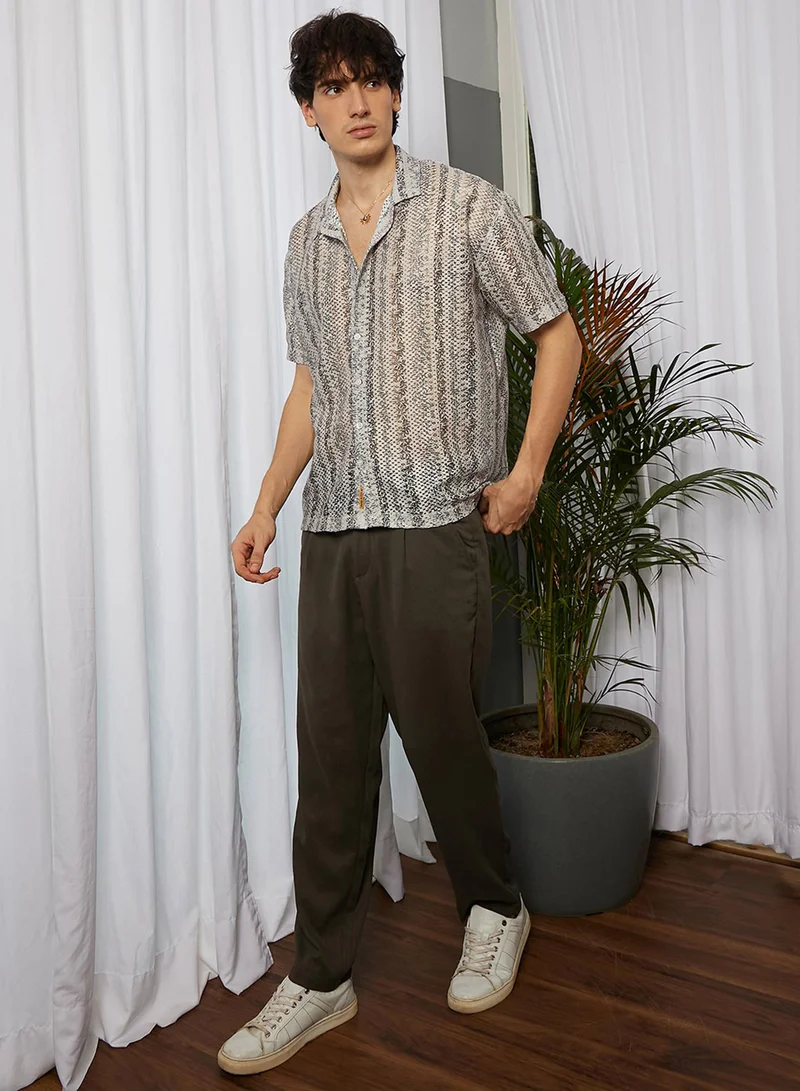 كامبوس سوترا Campus Sutra Men's Saltbox Beige Ditsy Foliage Oversized Shirt For Casual Wear | Cuban Collar | Short Sleeve | Button Closure | Oversized Shirt Crafted With Comfort Fit For Everyday Wear