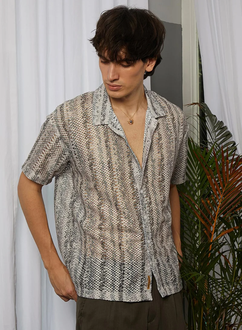 كامبوس سوترا Campus Sutra Men's Saltbox Beige Ditsy Foliage Oversized Shirt For Casual Wear | Cuban Collar | Short Sleeve | Button Closure | Oversized Shirt Crafted With Comfort Fit For Everyday Wear