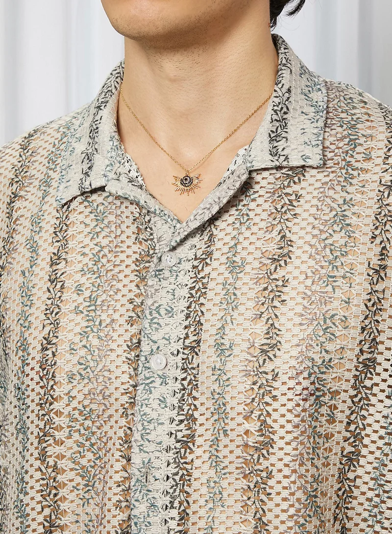 كامبوس سوترا Campus Sutra Men's Saltbox Beige Ditsy Foliage Oversized Shirt For Casual Wear | Cuban Collar | Short Sleeve | Button Closure | Oversized Shirt Crafted With Comfort Fit For Everyday Wear