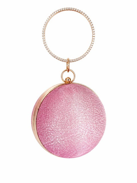 A luxurious round women's handbag in glossy pink, featuring a modern design with a studded round handle, perfect for special occasions and parties.
