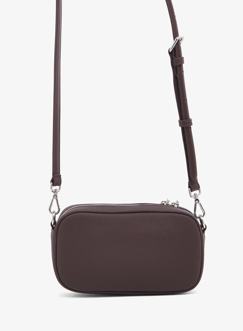 لاكوست حقيبة كروس بودي بشعار