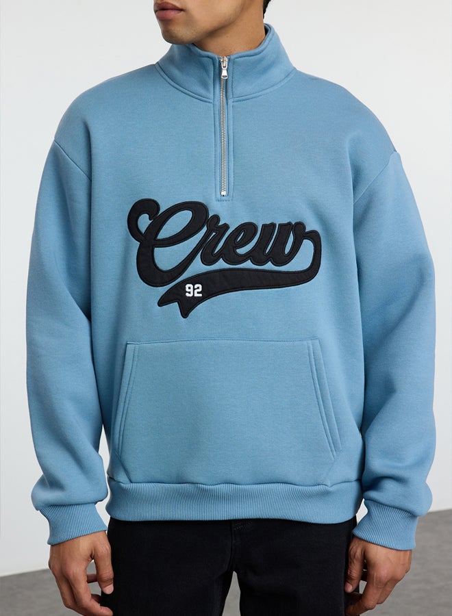 trendyol Blue Stand Collar Oversize/Wide Cut Stand Collar Zippered Text Embroidered Sweatshirt - Image 3