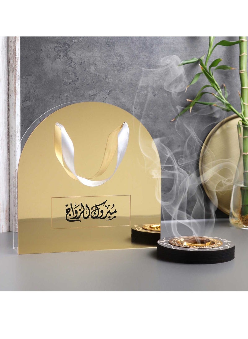 Story Of Candle An Incense Burner with Distinctive Arabic Engravings, a Luxurious Bag Made of White and Transparent Acrylic, a Box Containing Natural Oud Chips, and two Packages of a Quarter Tola of Luxurious Musk. - Image 3
