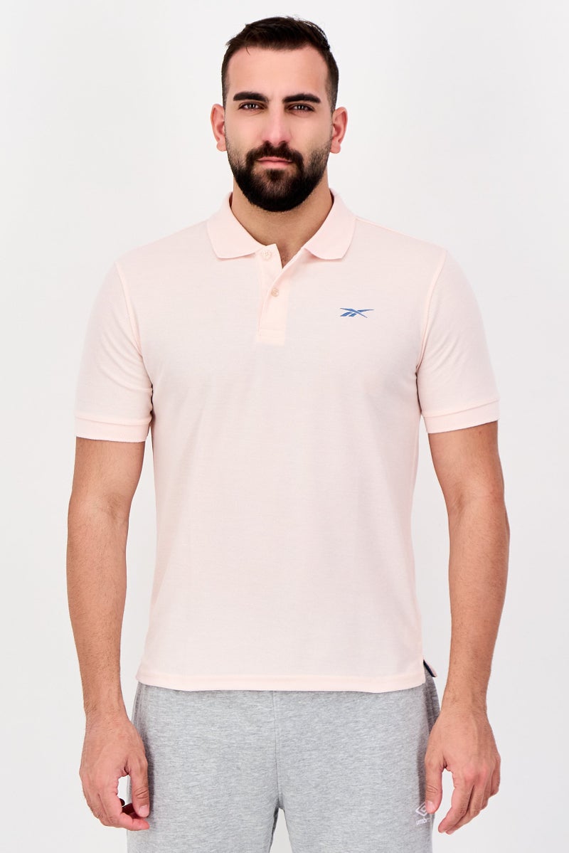 Reebok قميص بولو رياضي للرجال بأكمام قصيرة، خارجي، وردي - Image 1