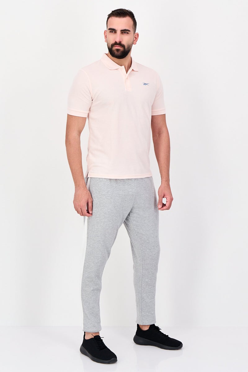 Reebok قميص بولو رياضي للرجال بأكمام قصيرة، خارجي، وردي - Image 4
