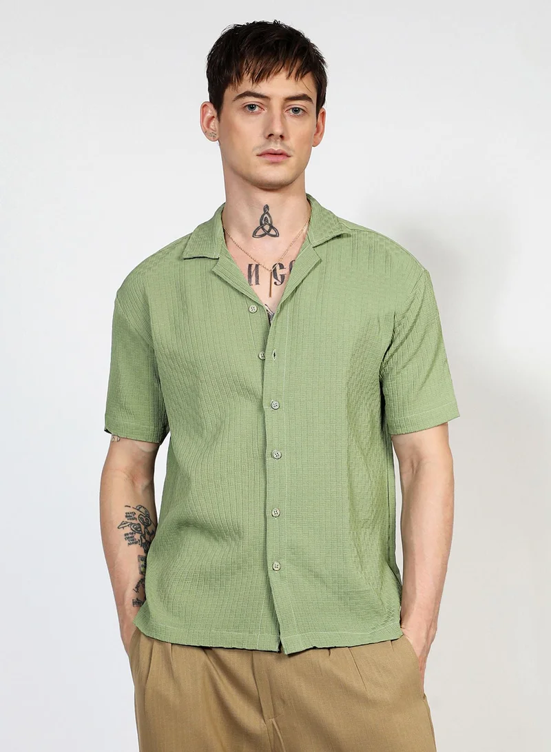 كامبوس سوترا Campus Sutra Men's Pistachio Green Oversized Interwine Shirt For Casual Wear | Cuban Collar | Short Sleeve | Button Closure | Shirt Crafted With Comfort Fit For Everyday Wear