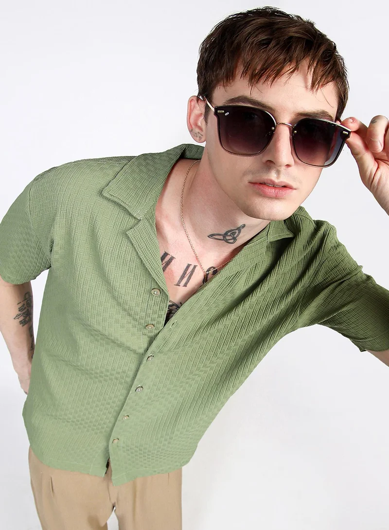 كامبوس سوترا Campus Sutra Men's Pistachio Green Oversized Interwine Shirt For Casual Wear | Cuban Collar | Short Sleeve | Button Closure | Shirt Crafted With Comfort Fit For Everyday Wear