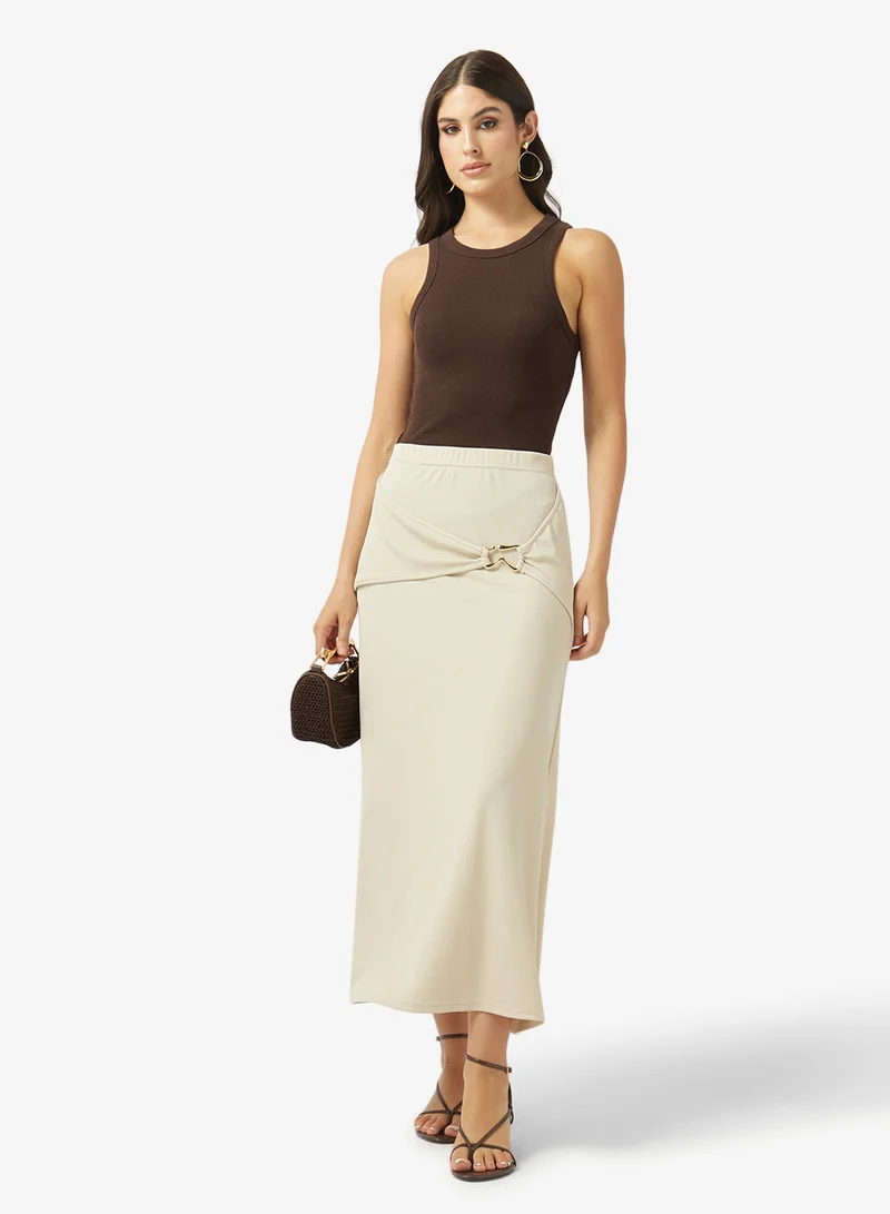 ايلا تنورة بحلقة معدنية