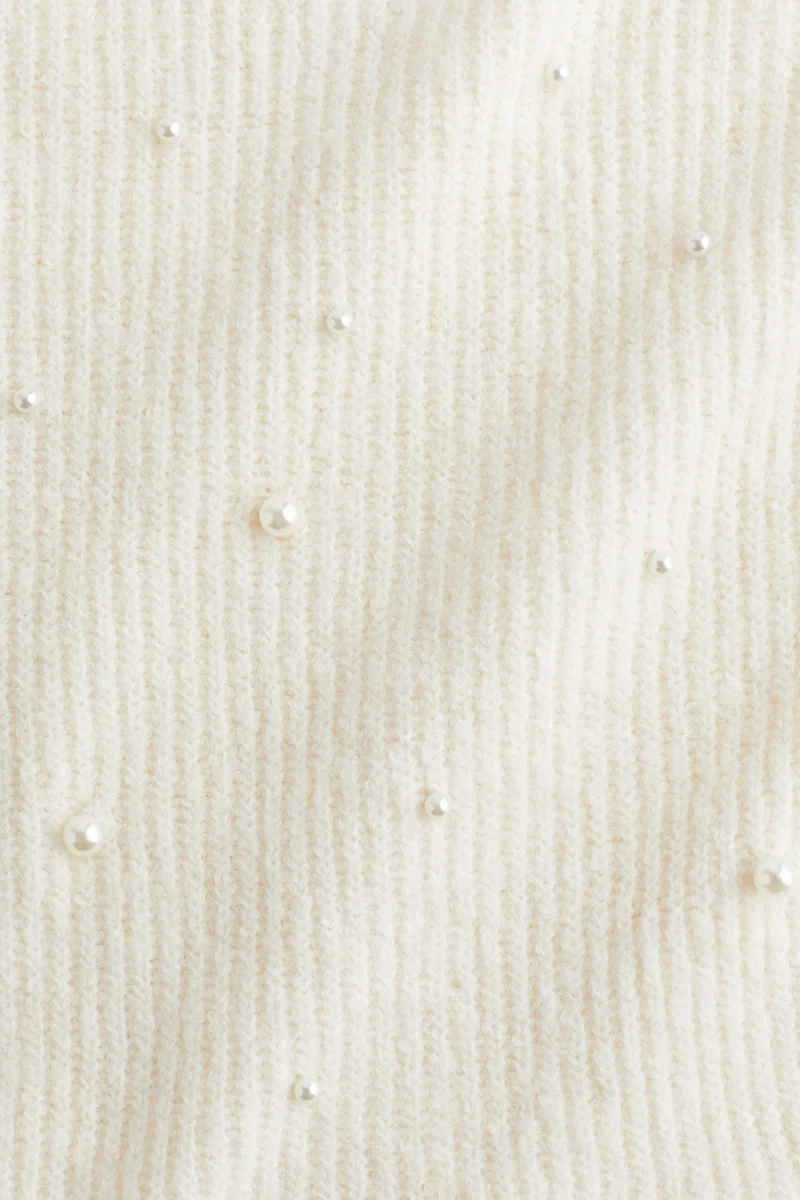 اتش اند ام بلوزة بيبلوم مزينة بالخرز