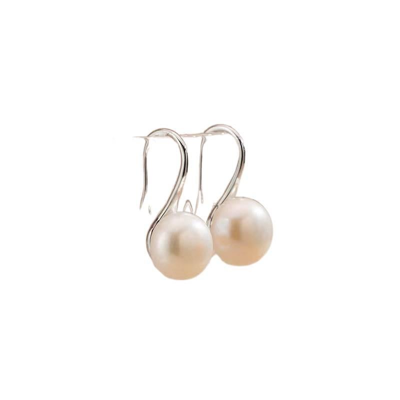 SK Gold Pearl Earrings with Silver Tone Finish and Lightweight Huggie Profile for Daily Wear and Elegant Styling - Image 4