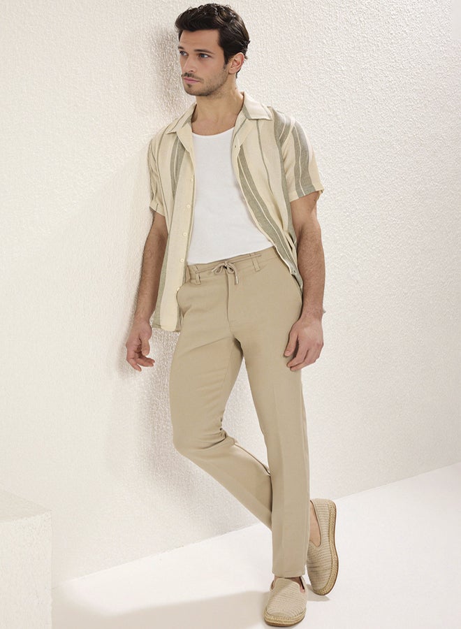 trendyol Slim Fit Waist Tie Detail Elastic Fabric Woven Trousers TMNAW25PL00027 - Image 1