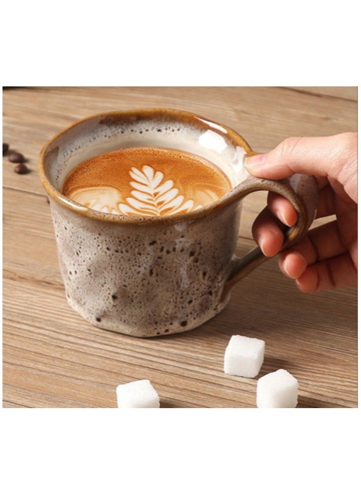 Qahwa Light brown ceramic mug with black dots, streamlined handle and dark edges, perfect for use.  - Image 1