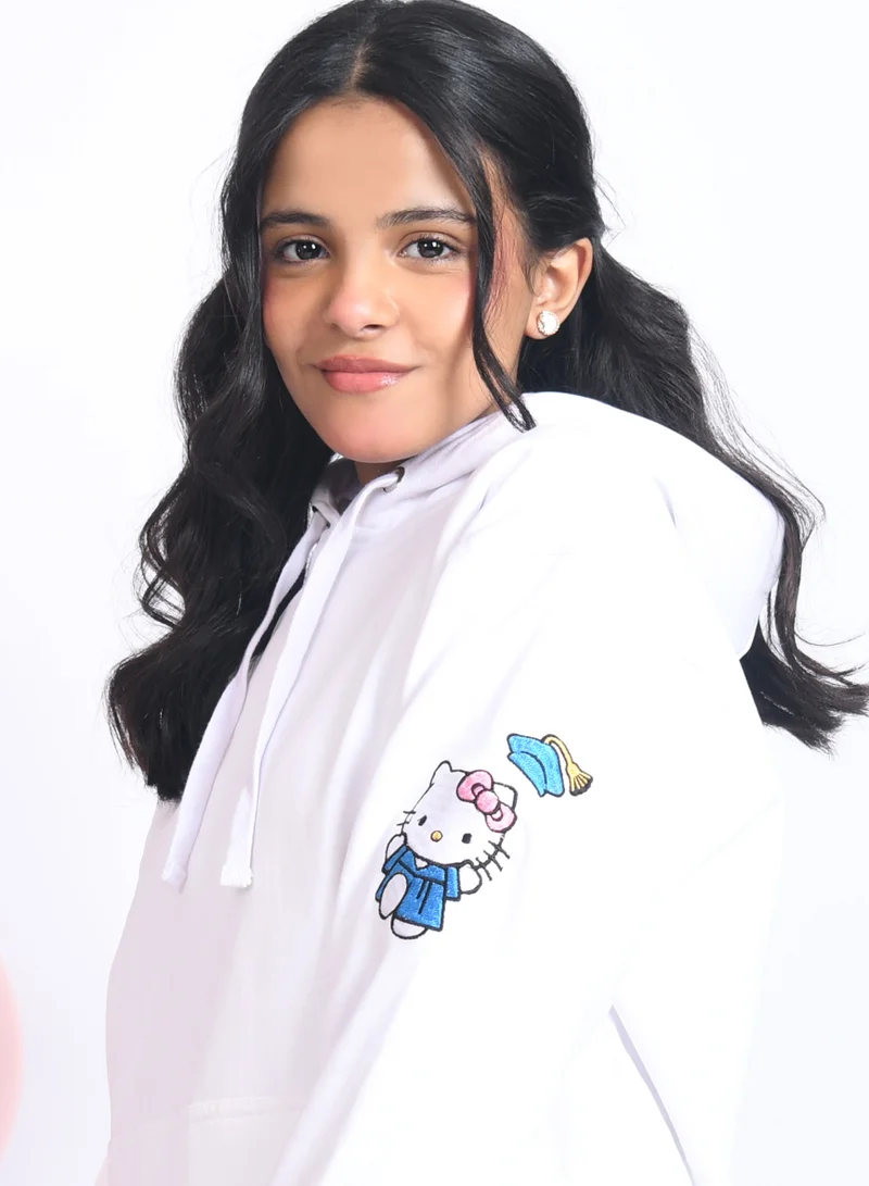 HAWRAA ABAYA White graduation hoodie with custom embroidery.