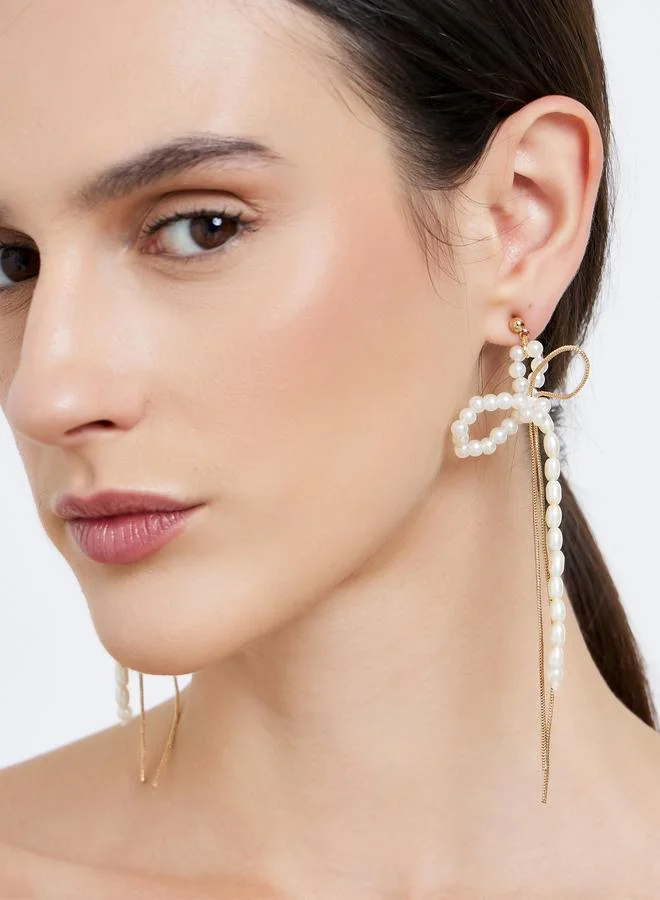 Styli Styli Pearl Bow Dangle Earrings