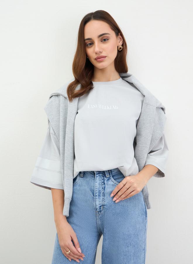 Styli Grey Oversized Slogan Print T-Shirt - Image 1
