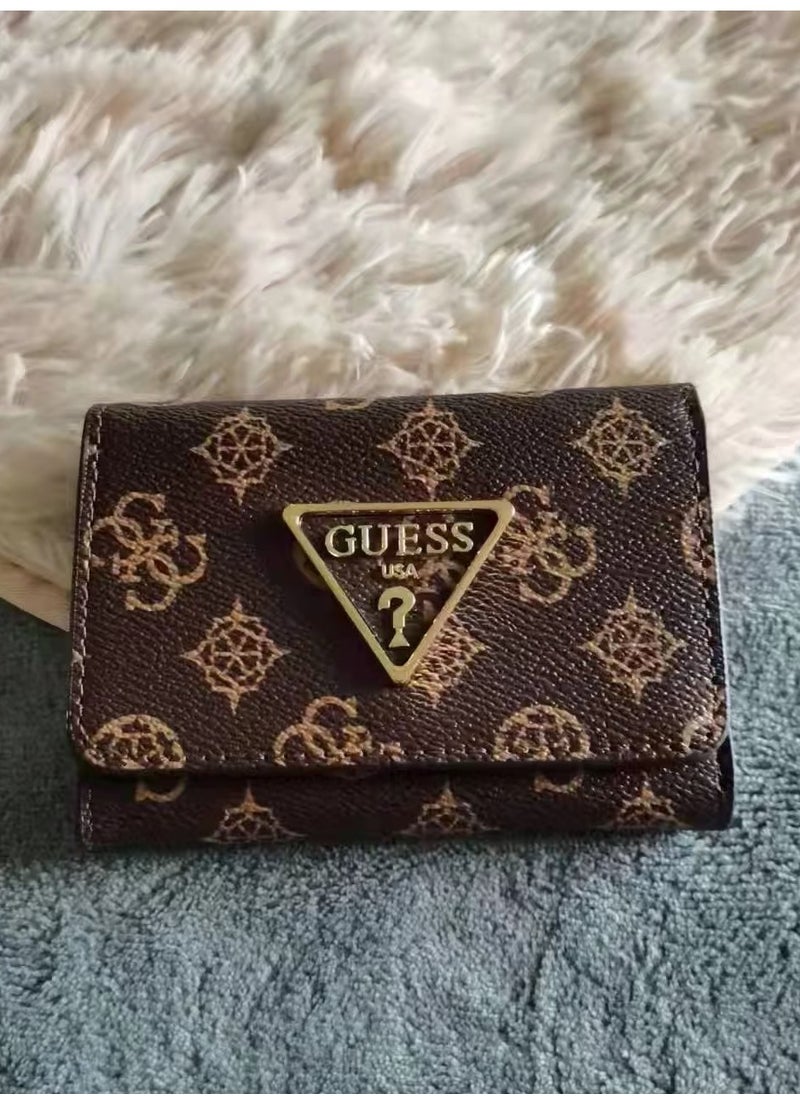 Guest Ladies trifold holding coin purse 