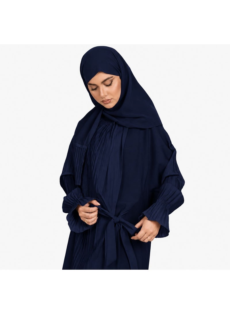 Women's prayer garment featuring an open front with a tie closure and a loose, comfortable fit; designed with soft, pleated sleeves and made from lightweight fabric suitable for prayer, Umrah, Hajj, and daily use.
