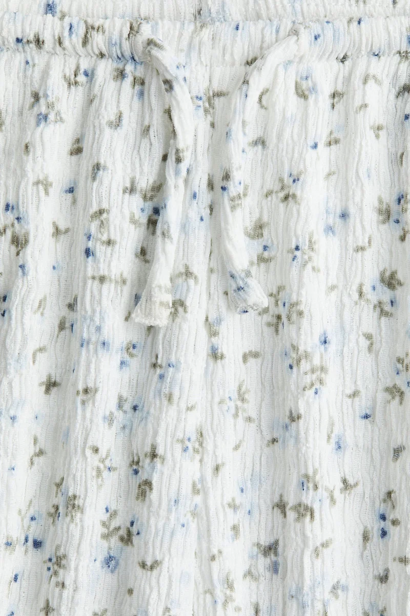 اتش اند ام بنطلون منقوش من الجيرسيه