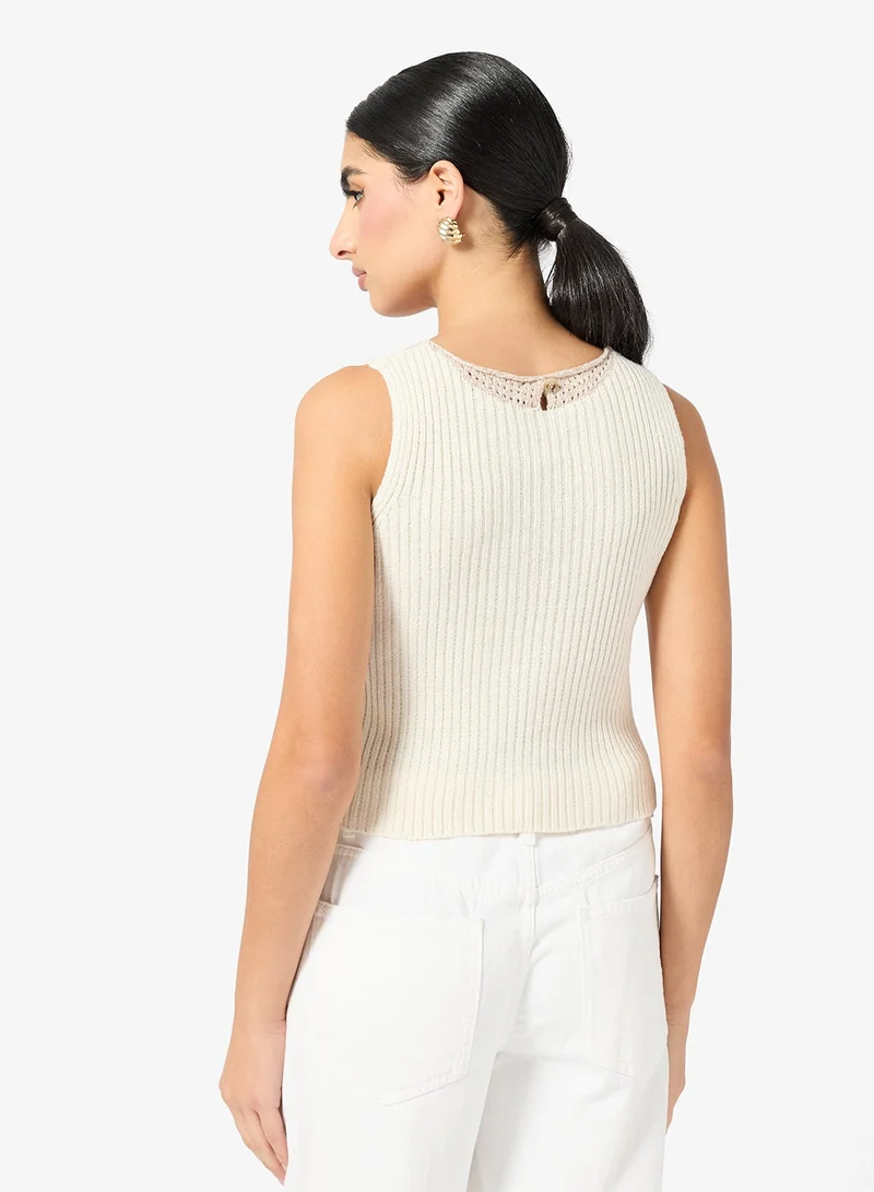 ايلا بلوزة محبوكة