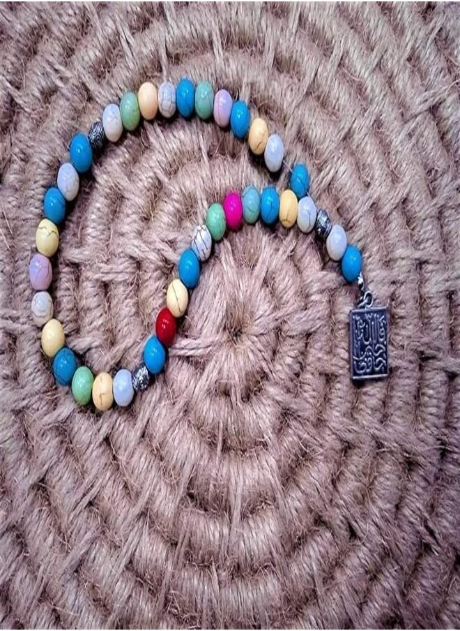 tag - Rosary33 beads of multi colors with a religious silver pendant - Image 1