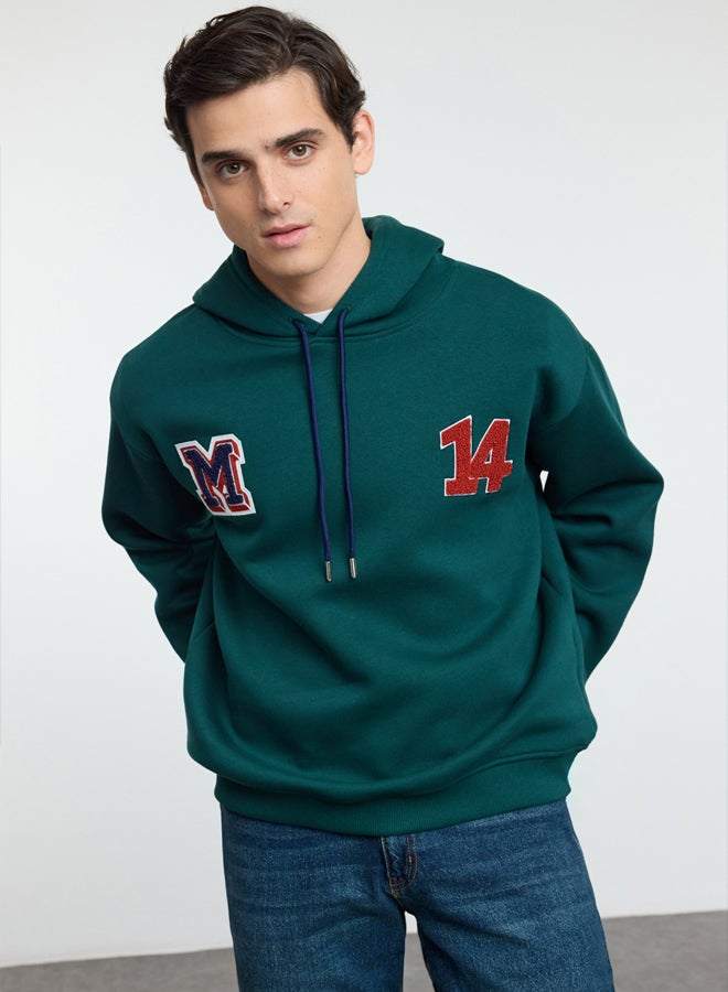 trendyol Emerald Green Oversize/Wide Cut Letter Patch and Embroidery Detailed Hooded Sweatshirt - Image 1