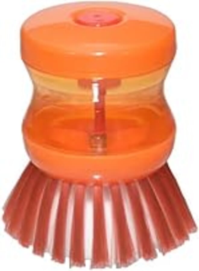 Dishes brush with soap dispenser