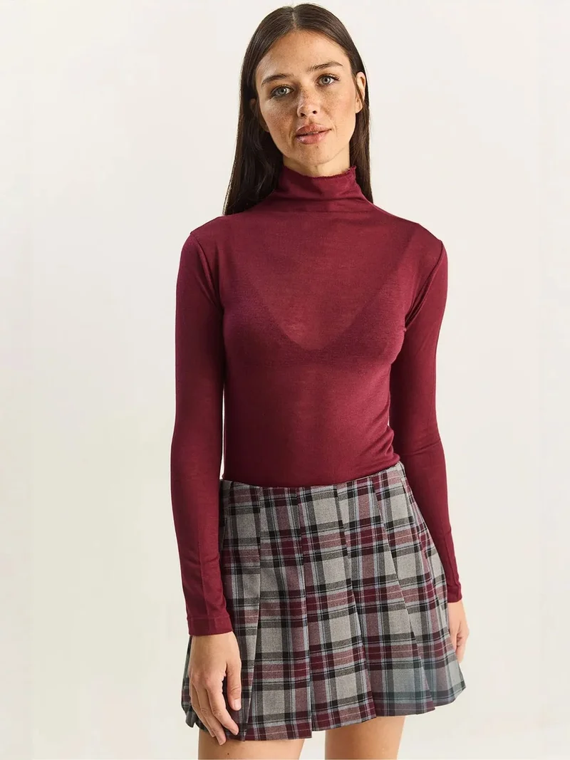 بيانكو لوتشي LUCCI Fitted Long Sleeve Turtleneck Blouse
