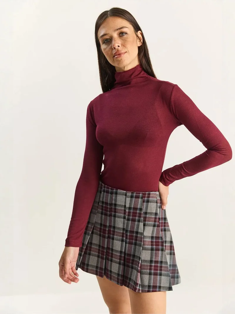 بيانكو لوتشي LUCCI Fitted Long Sleeve Turtleneck Blouse