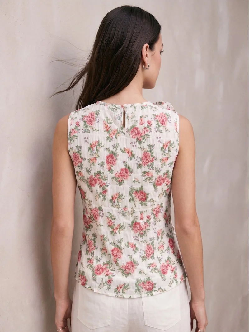 Outzidr  White Elegant Sleeveless Blouse With Ruffle And Corsage Detail for Women | Best Price UAE