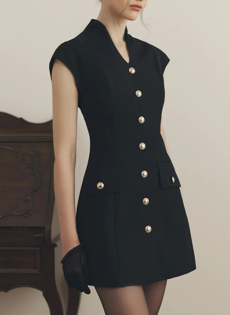 Fitted mini dress with golden buttons