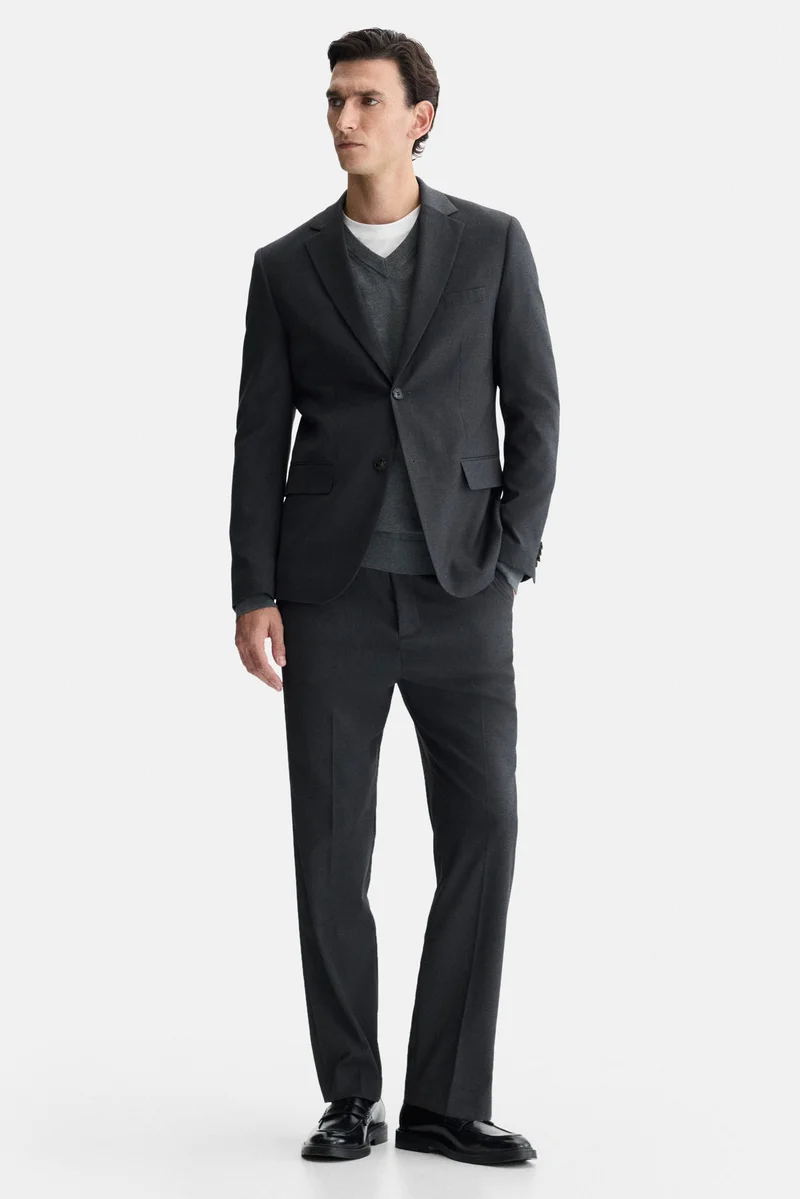 اتش اند ام جاكيت بصف أزرار فردي وبقصّة عادية