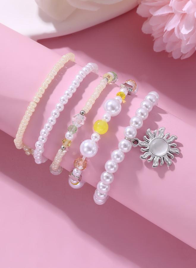 Take Two Pack of 5 - Girls Multi-Color Pearl Beaded Bracelets with Sun Charm - Image 1