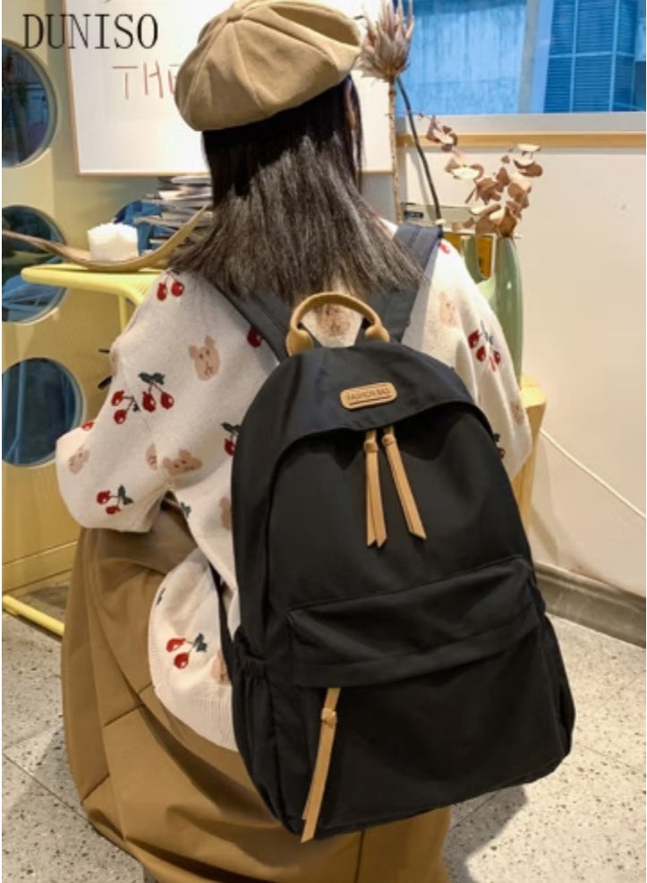 DUNISO Minimalist Black Backpack, A Must - Have for Students on the Go - Image 1