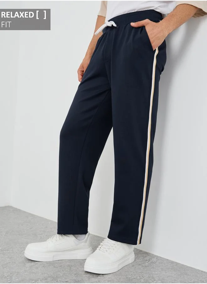 ستايلي Styli Mid Rise Relaxed Fit Joggers with Tape Detail