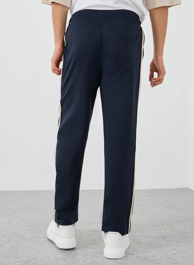 Styli Styli Mid Rise Relaxed Fit Joggers with Tape Detail