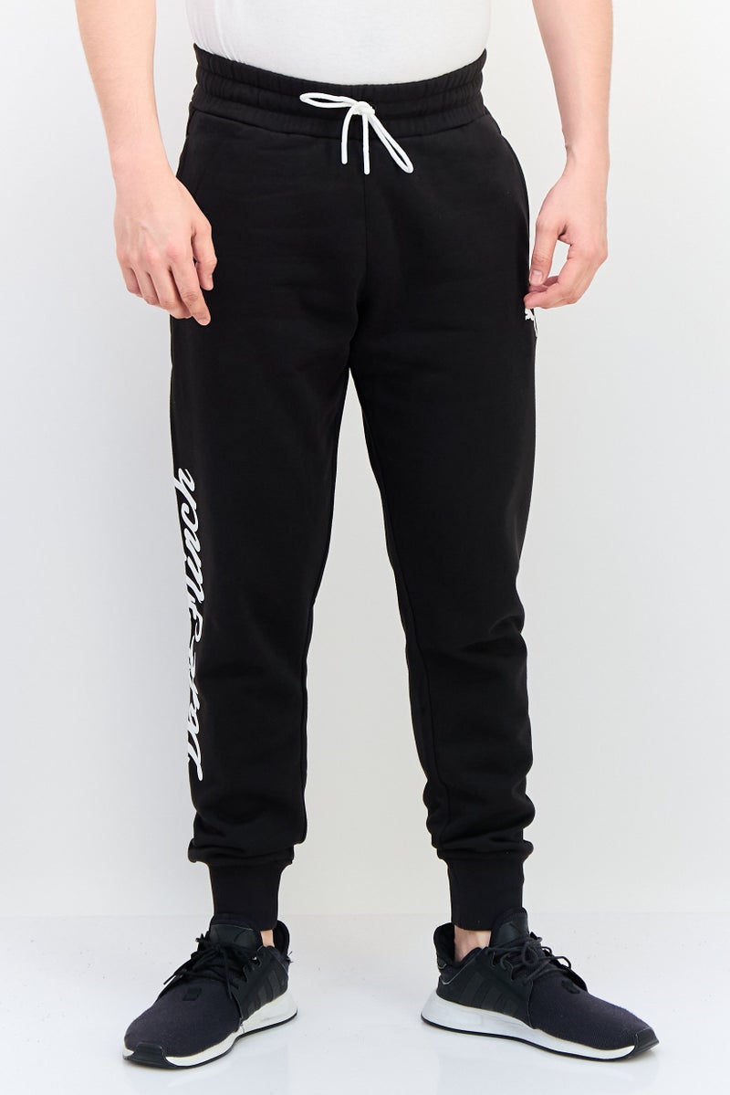 PUMA Men Sportswear Fit Training Sweatpants, Black - Image 1