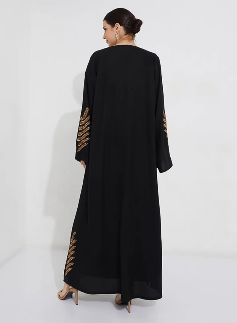 Rosette Abaya Leaves waving abaya