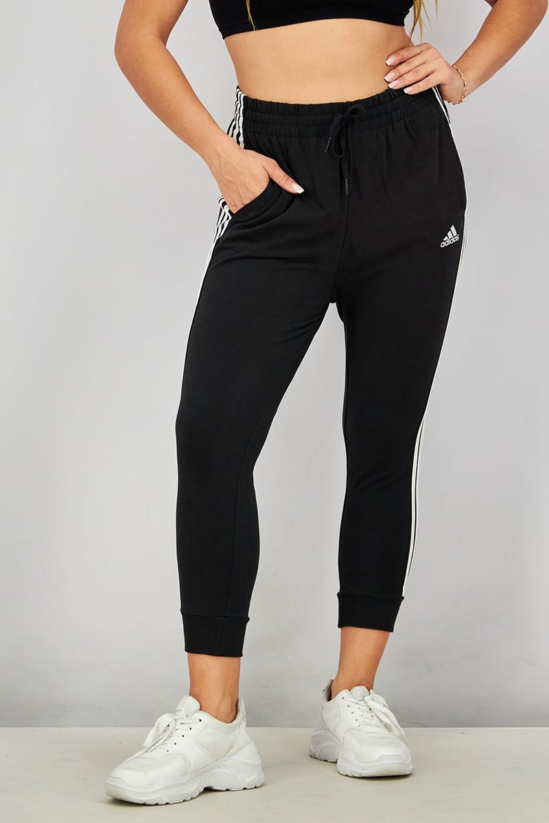 Adidas سروال رياضي نسائي مناسب بسحاب، أسود وأبيض - Image 1