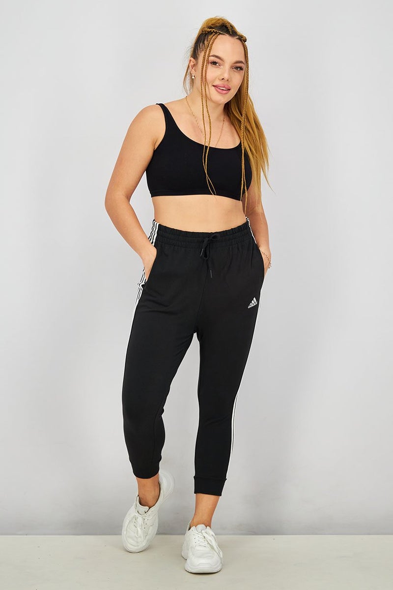 Adidas سروال رياضي نسائي مناسب بسحاب، أسود وأبيض - Image 2