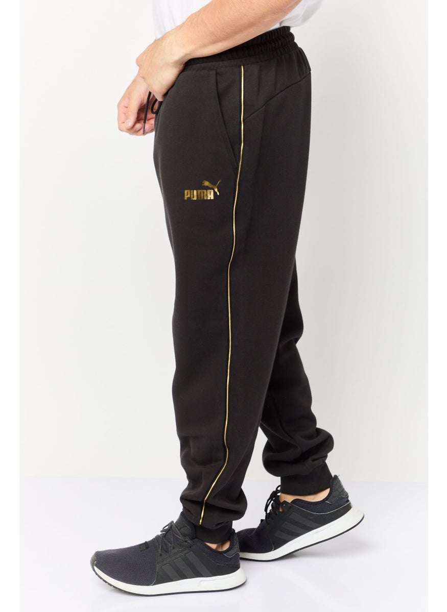 PUMA Men Sportswear Fit Brand Logo Outdoor Sweatpants, Black  - Image 3