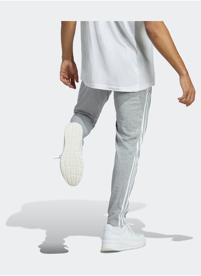 Adidas - Essentials Single Jersey Tapered Open Hem 3-Stripes Joggers - Image 1