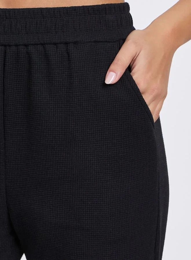 Styli Solid Elastic Waist Cuffed Cropped Joggers