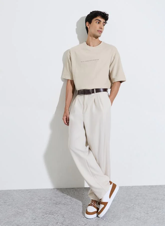 Styli Beige Graphic Print Crew Neck Oversized T-Shirt