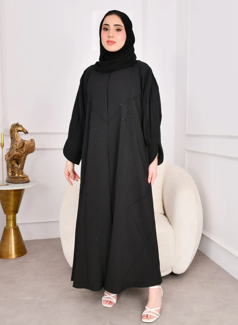 HAWRAA ABAYA Black closed abaya with pleated sleeves decorated with embroidery and beading