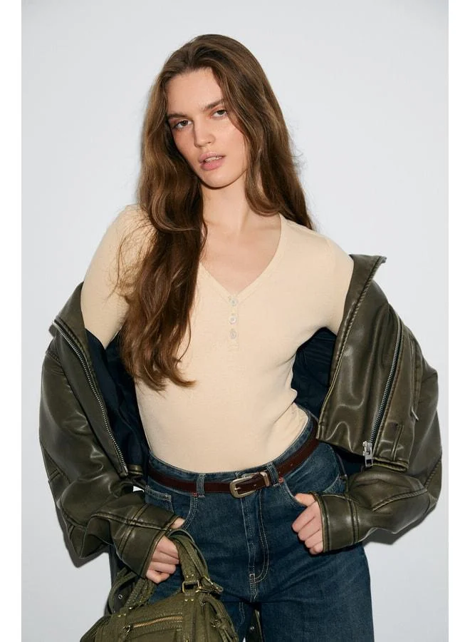 Grimelange KALANI Women's Long Sleeve Snap V-Neck Button-Embellished Beige Blouse.