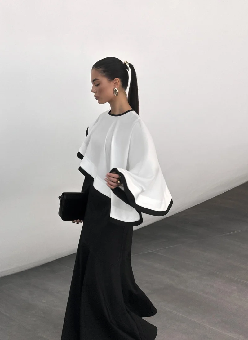 Maxi dress with contrasting cape