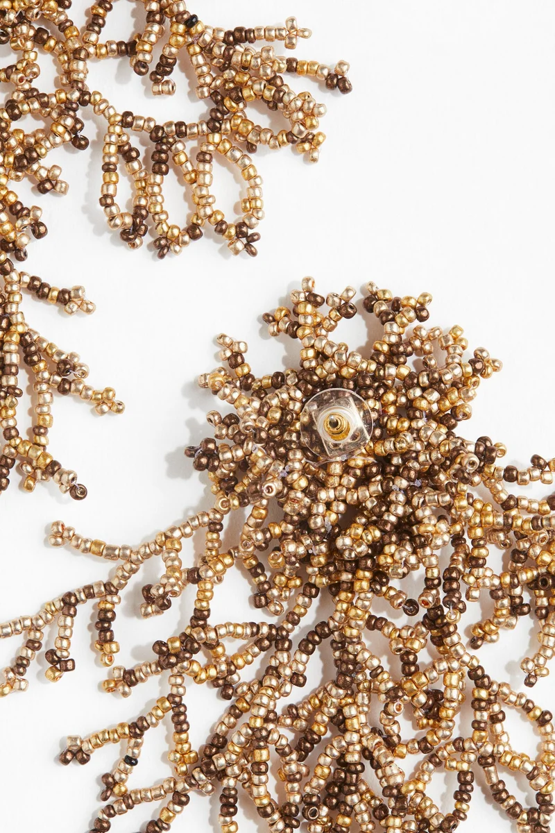 اتش اند ام حُلقان بتصميم من الخرز