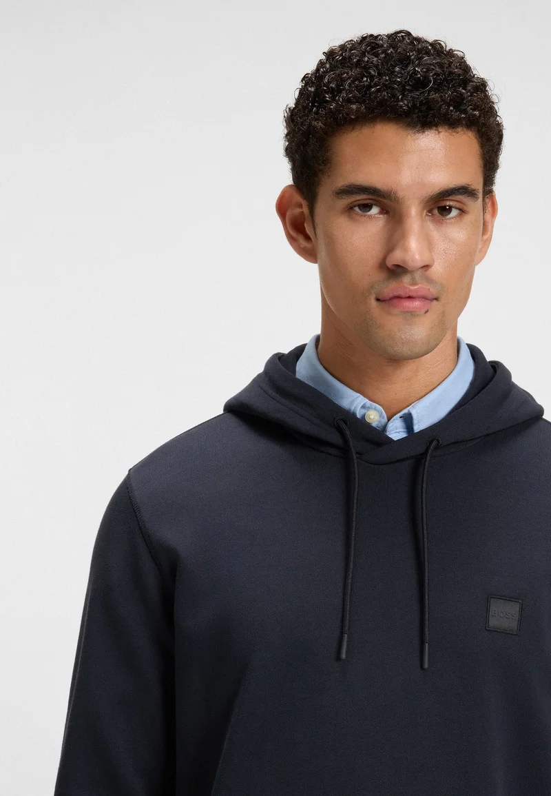 بوس هودي قطن تيري مع رقعة شعار