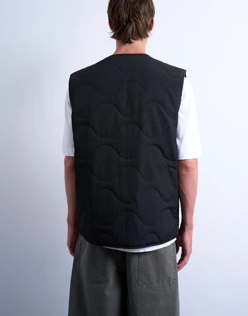 توب مان سترة مبطنة مربعة باللون الأسود